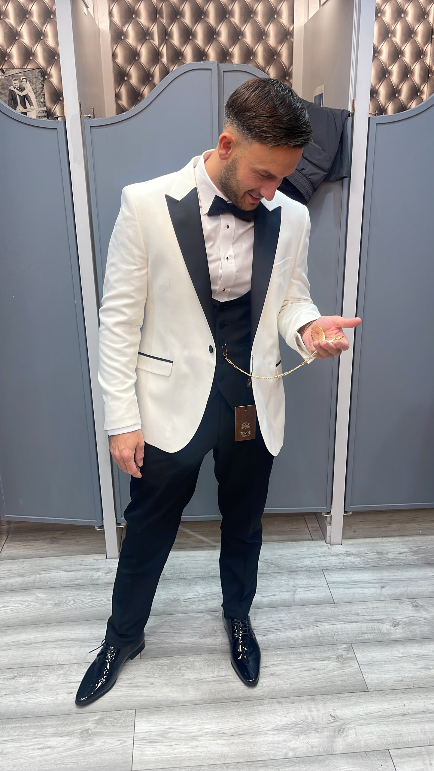 White tux with black lapel peak collar