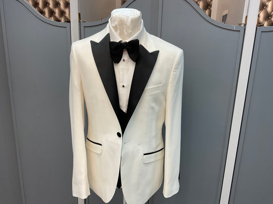 White tux with black lapel peak collar