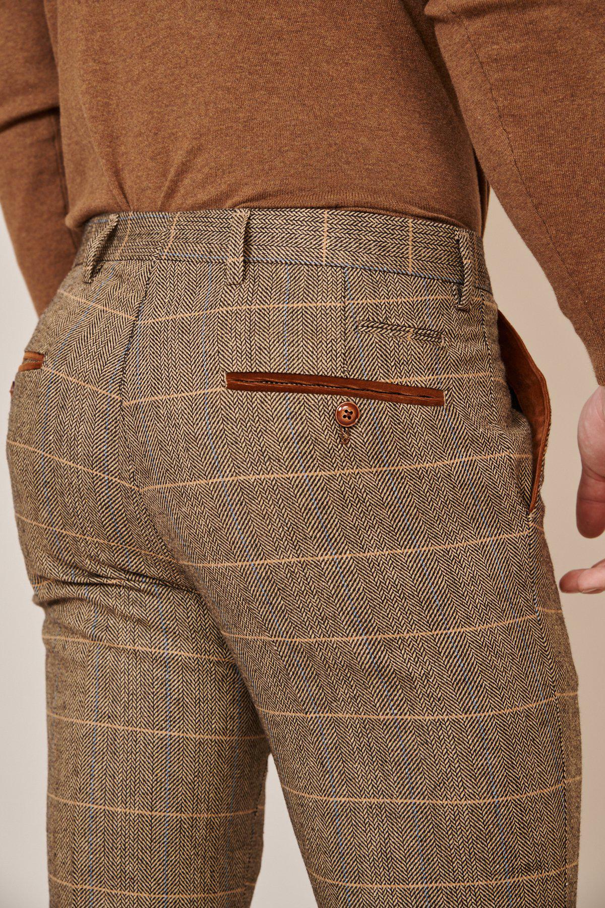 Man wearing men's TED - Tan Tweed Check Trousers - Marc Darcy Menswear