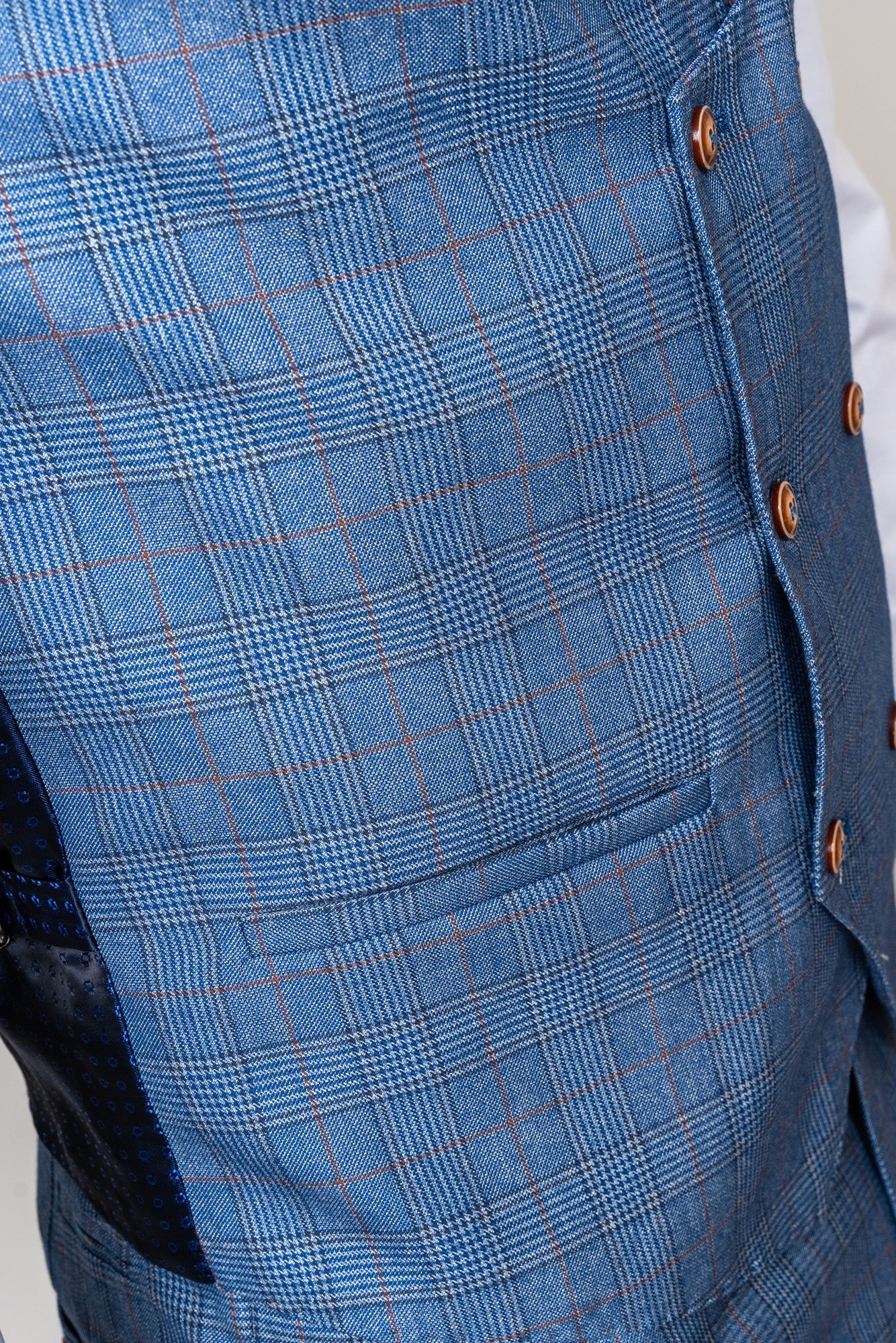Close-up of George light blue three piece suit - Marc Darcy