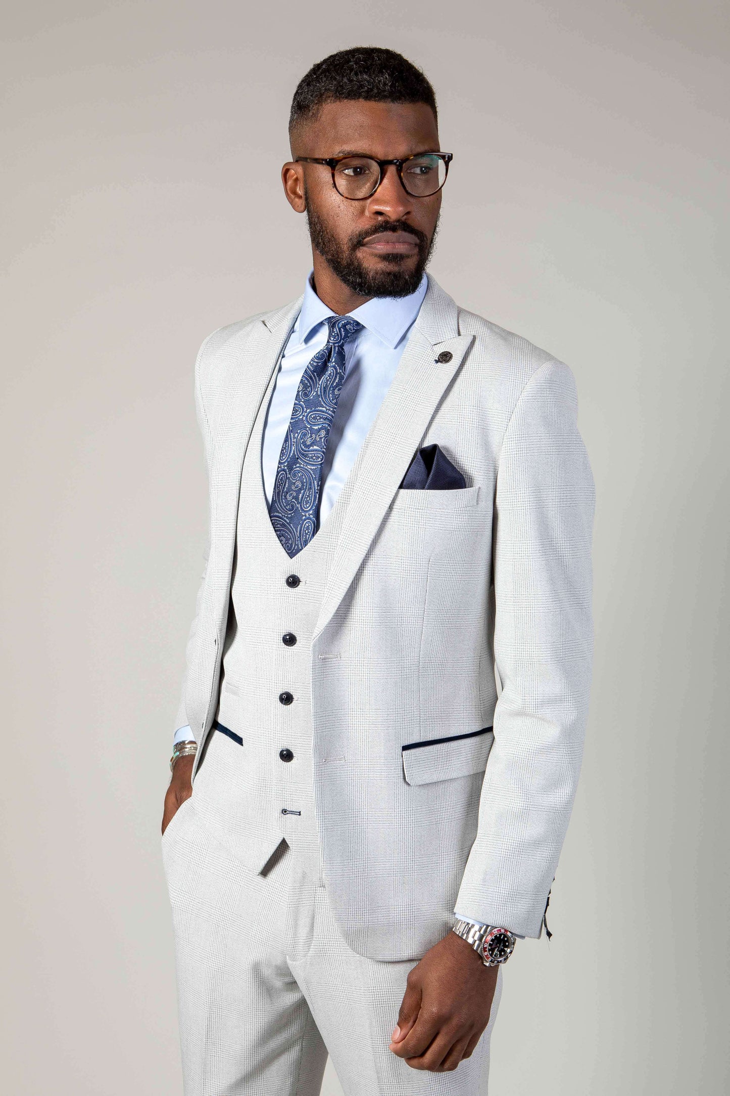 Man wearing men's BROMLEY - Stone Check Blazer - Marc Darcy Menswear