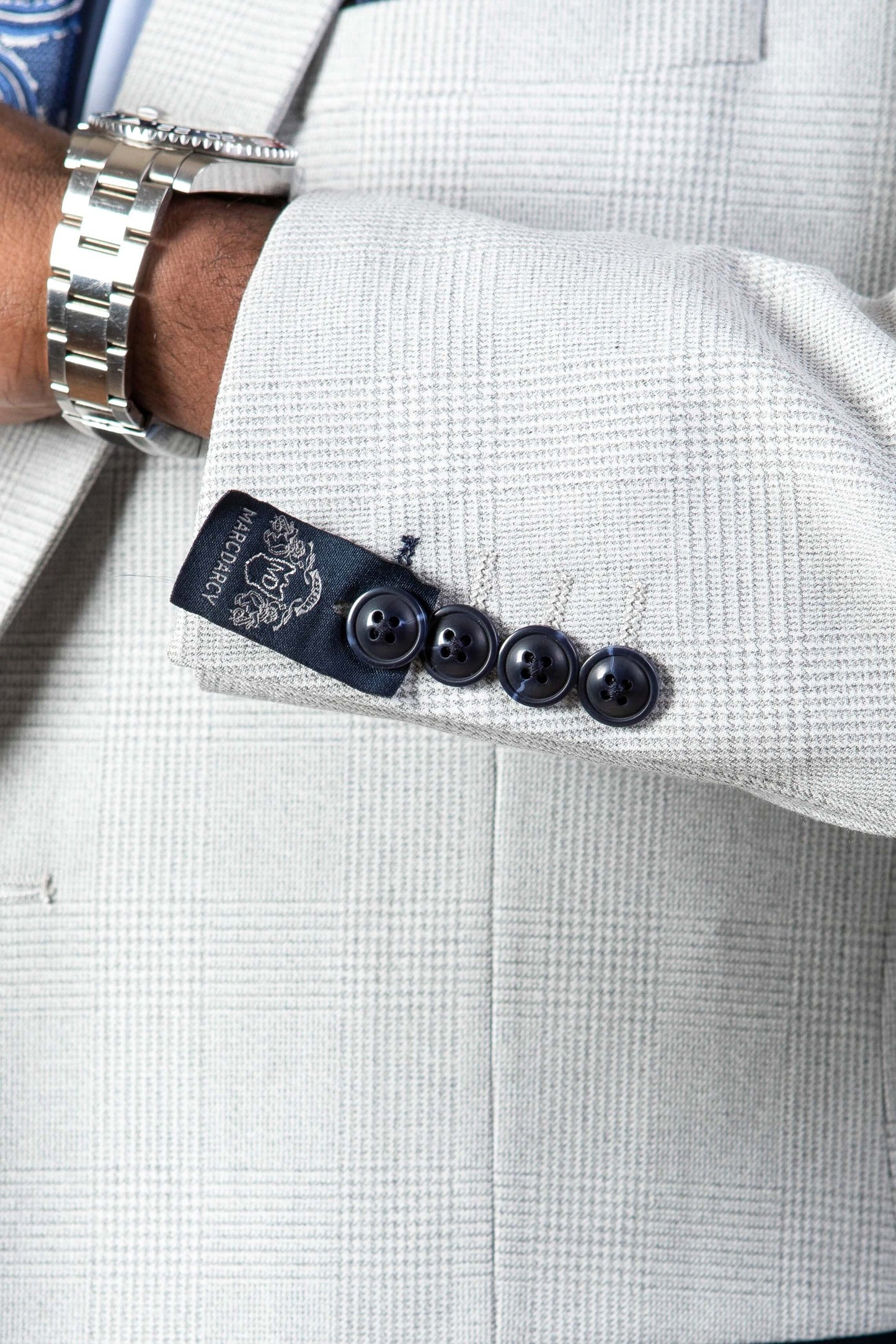 Man wearing men's BROMLEY - Stone Check Blazer - Marc Darcy Menswear