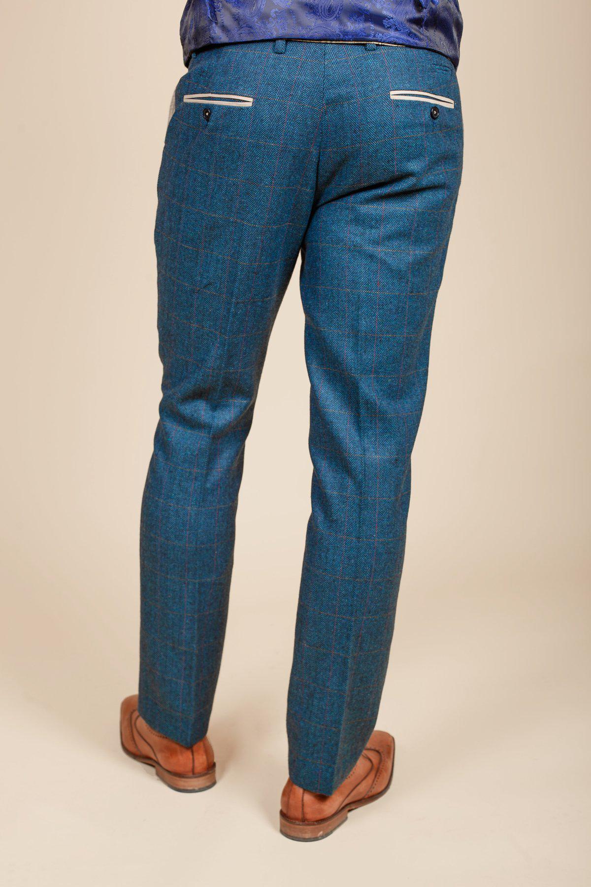 Man wearing men's DION - Blue Tweed Check Trousers - Marc Darcy Menswear