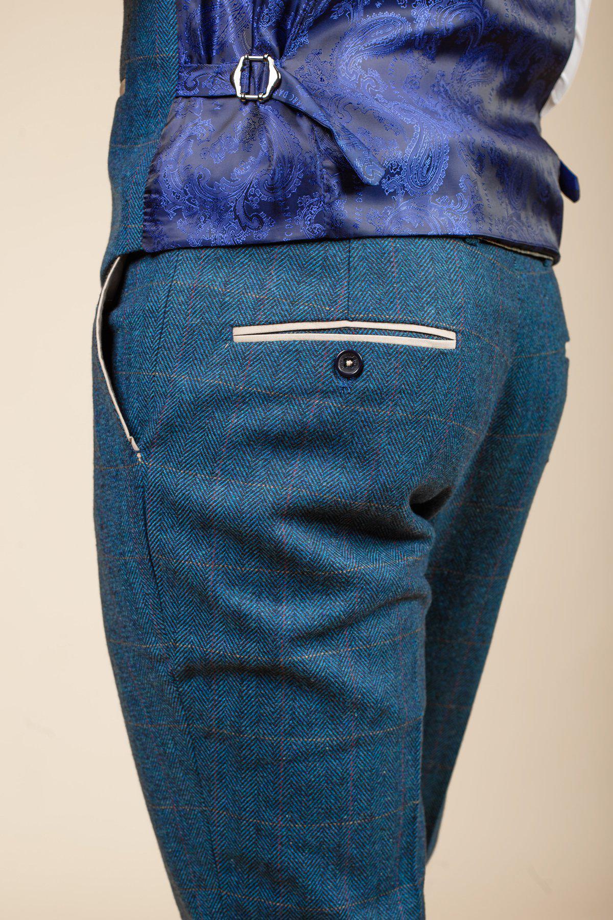 Man wearing men's DION - Blue Tweed Check Trousers - Marc Darcy Menswear