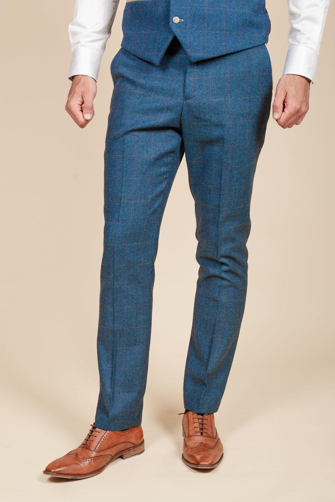 Man wearing men's DION - Blue Tweed Check Trousers - Marc Darcy Menswear