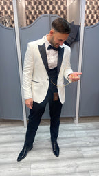 White tux with black lapel peak collar