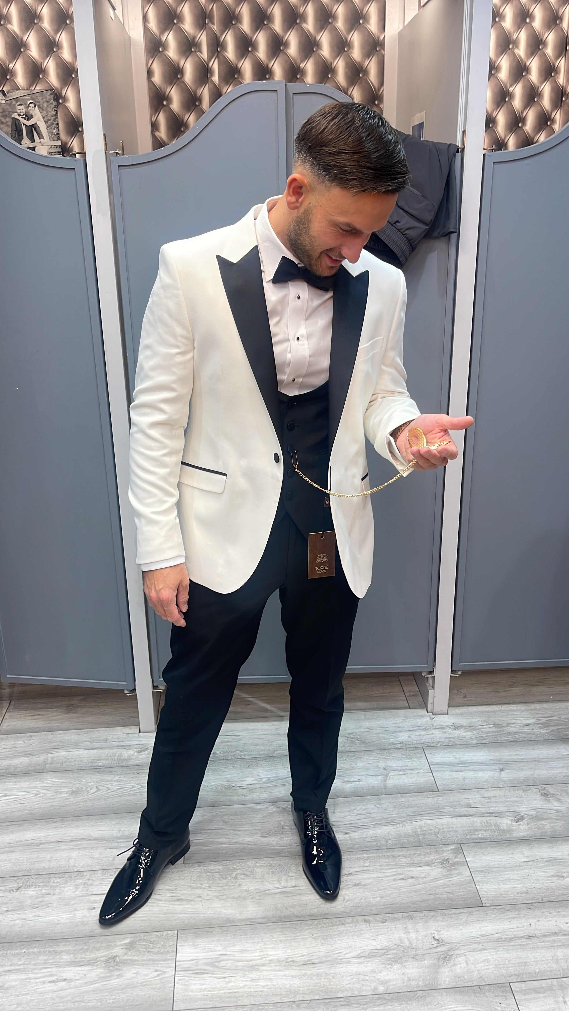 White tux with black lapel peak collar