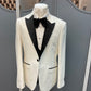 White tux with black lapel peak collar