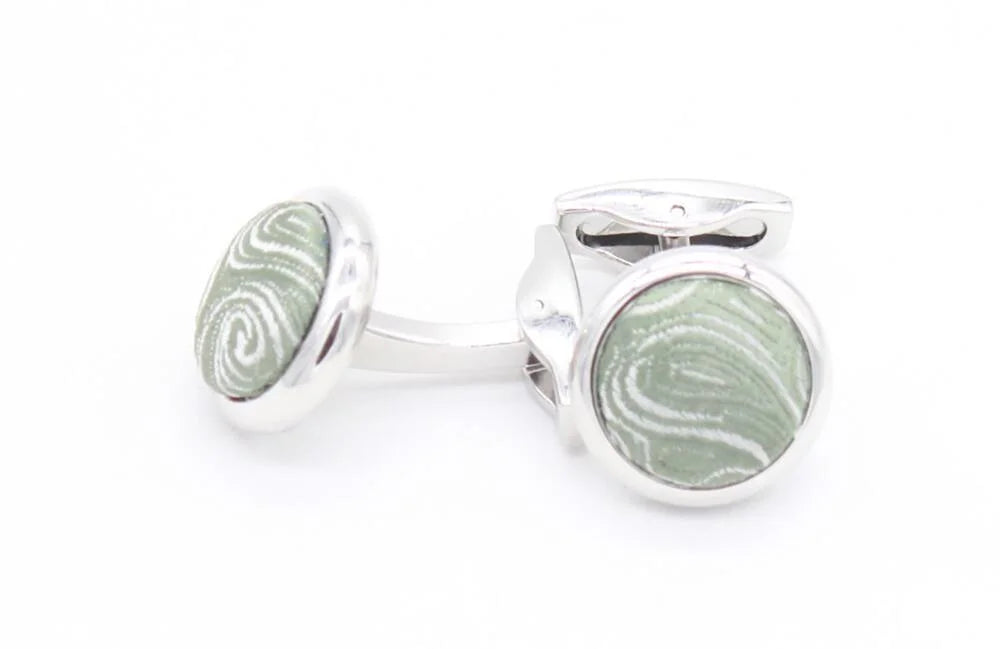 A set of Wedding paisley fabric covered cufflinks