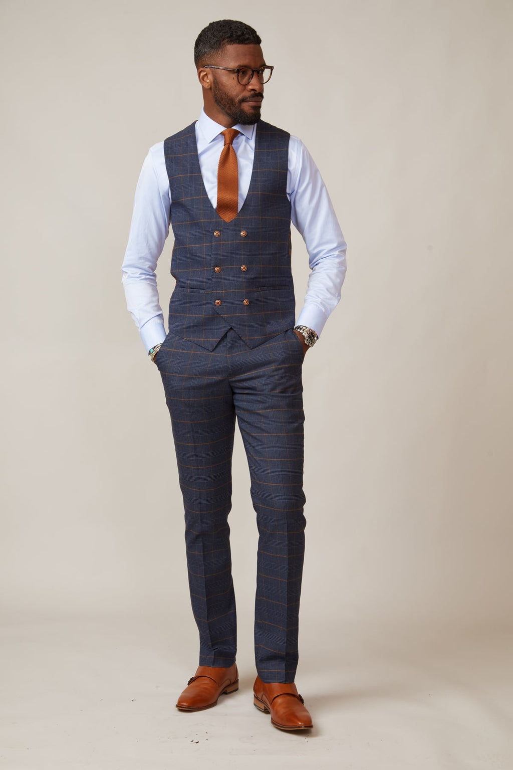 Man wearing men's JENSON - Marine Navy Check Double Breasted Waistcoat - Marc Darcy Menswear