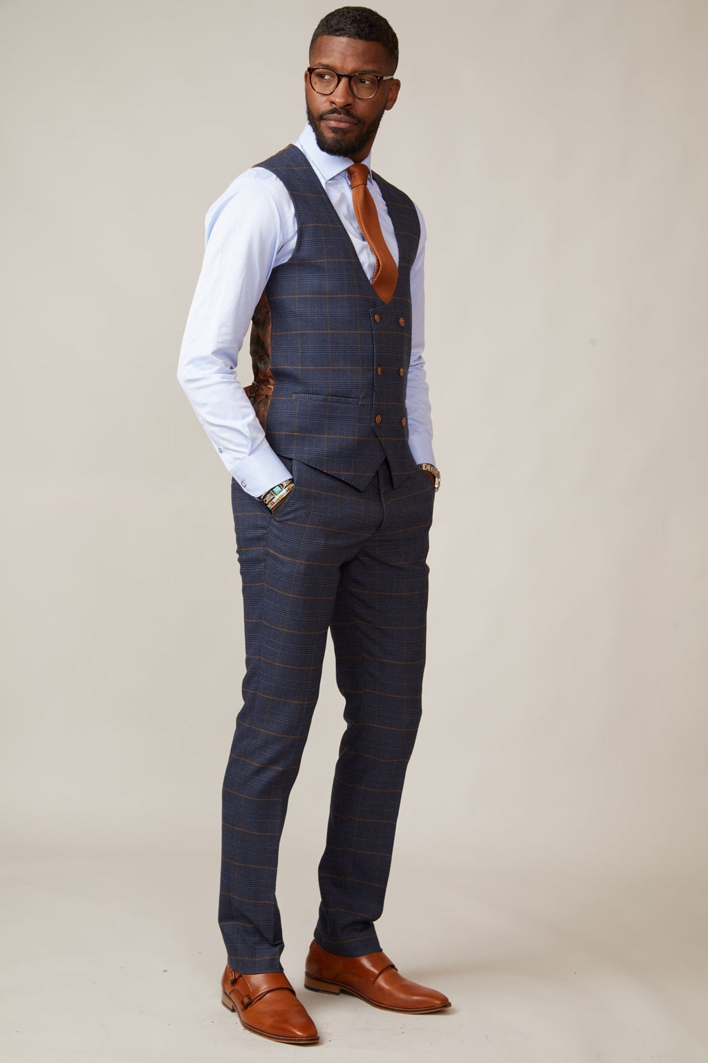 Man wearing men's JENSON - Marine Navy Check Double Breasted Waistcoat - Marc Darcy Menswear
