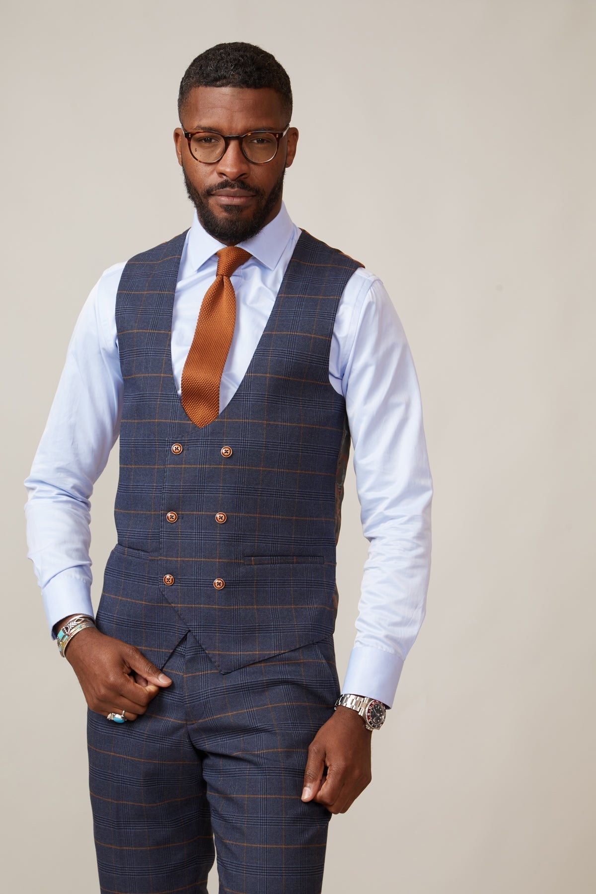 Man wearing men's JENSON - Marine Navy Check Double Breasted Waistcoat - Marc Darcy Menswear