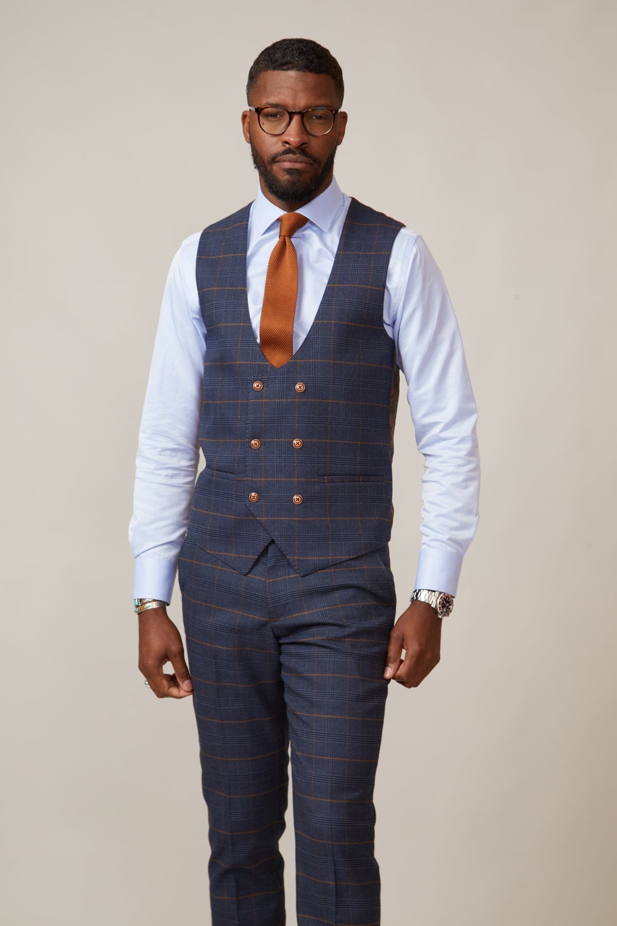 Man wearing men's JENSON - Marine Navy Check Double Breasted Waistcoat - Marc Darcy Menswear