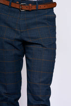 Man wearing men's JENSON - Marine Navy Check Trousers - Marc Darcy Menswear
