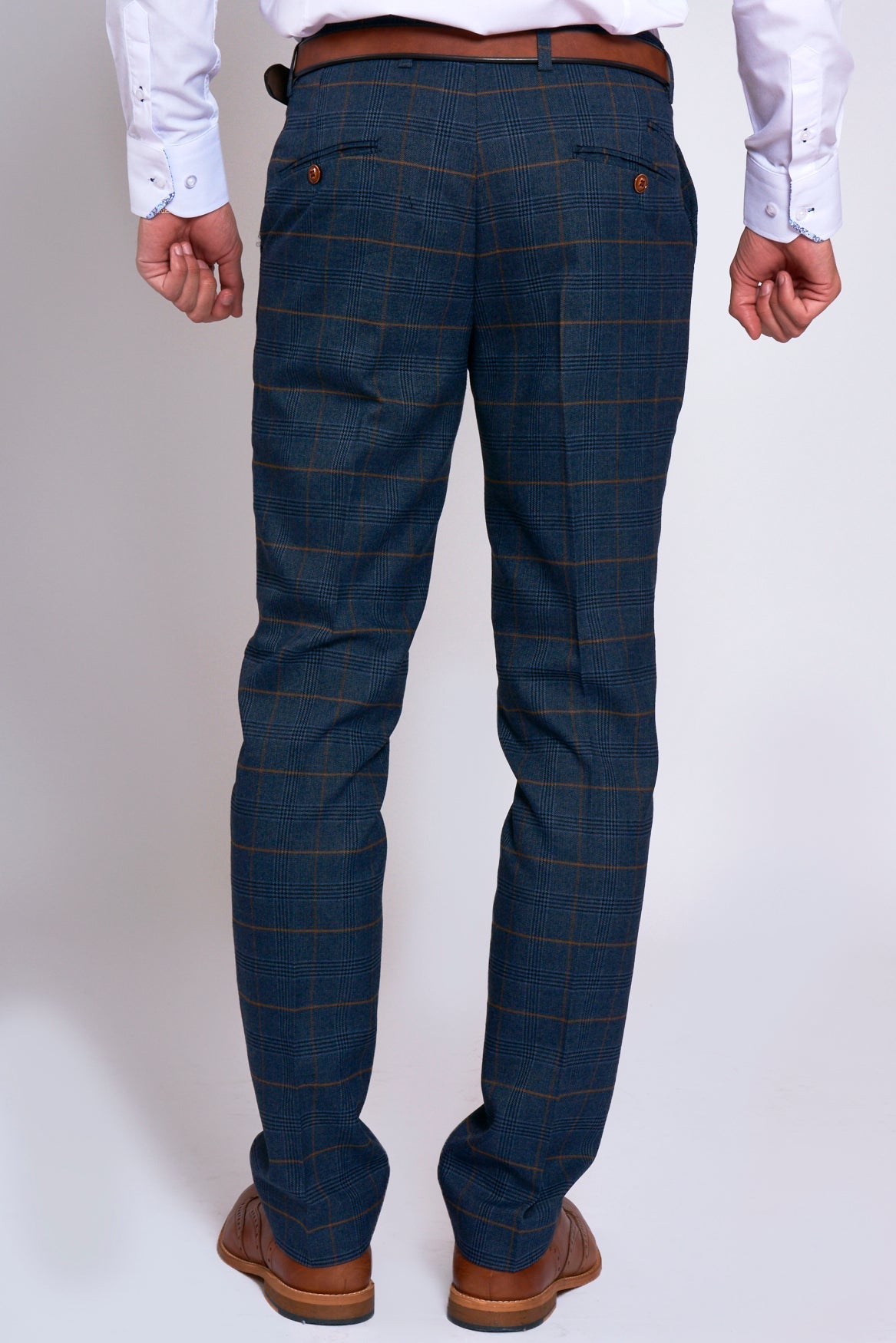 Man wearing men's JENSON - Marine Navy Check Trousers - Marc Darcy Menswear
