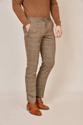 Man wearing men's TED - Tan Tweed Check Trousers - Marc Darcy Menswear