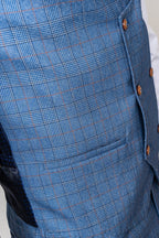 Close-up of George light blue three piece suit - Marc Darcy