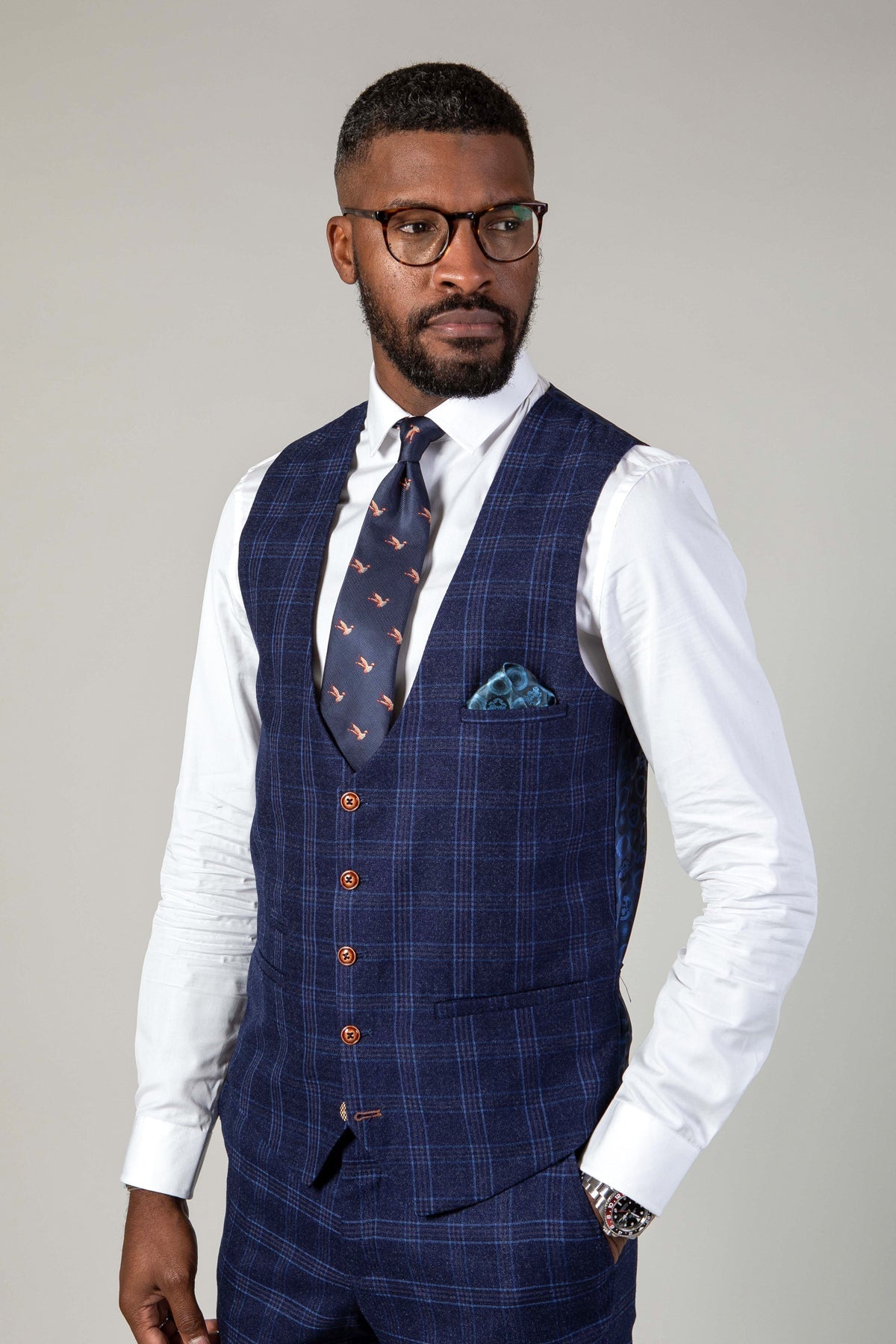 Man wearing men's CHIGWELL - Blue Tweed Check Waistcoat - Marc Darcy Menswear