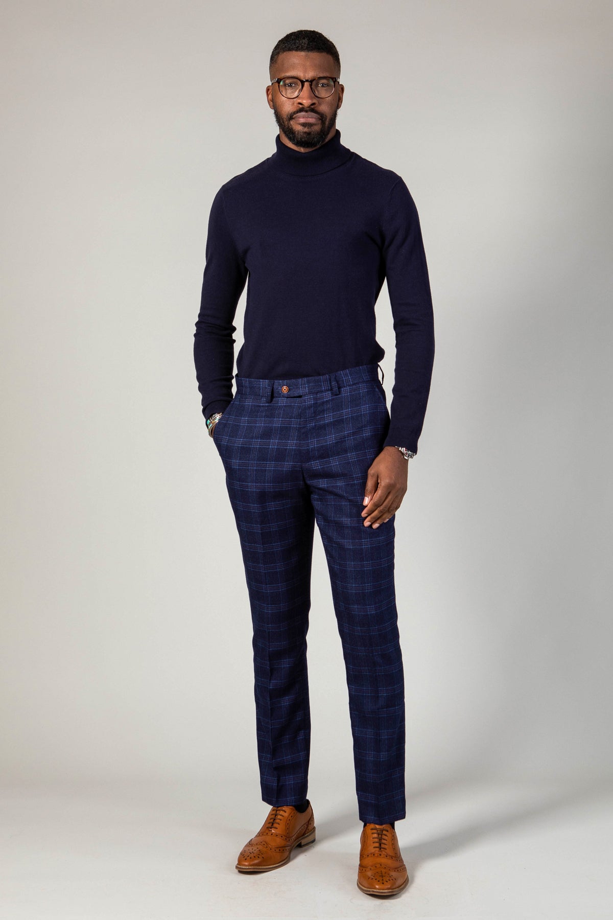 Man wearing men's CHIGWELL - Blue Tweed Check Trousers - Marc Darcy Menswear