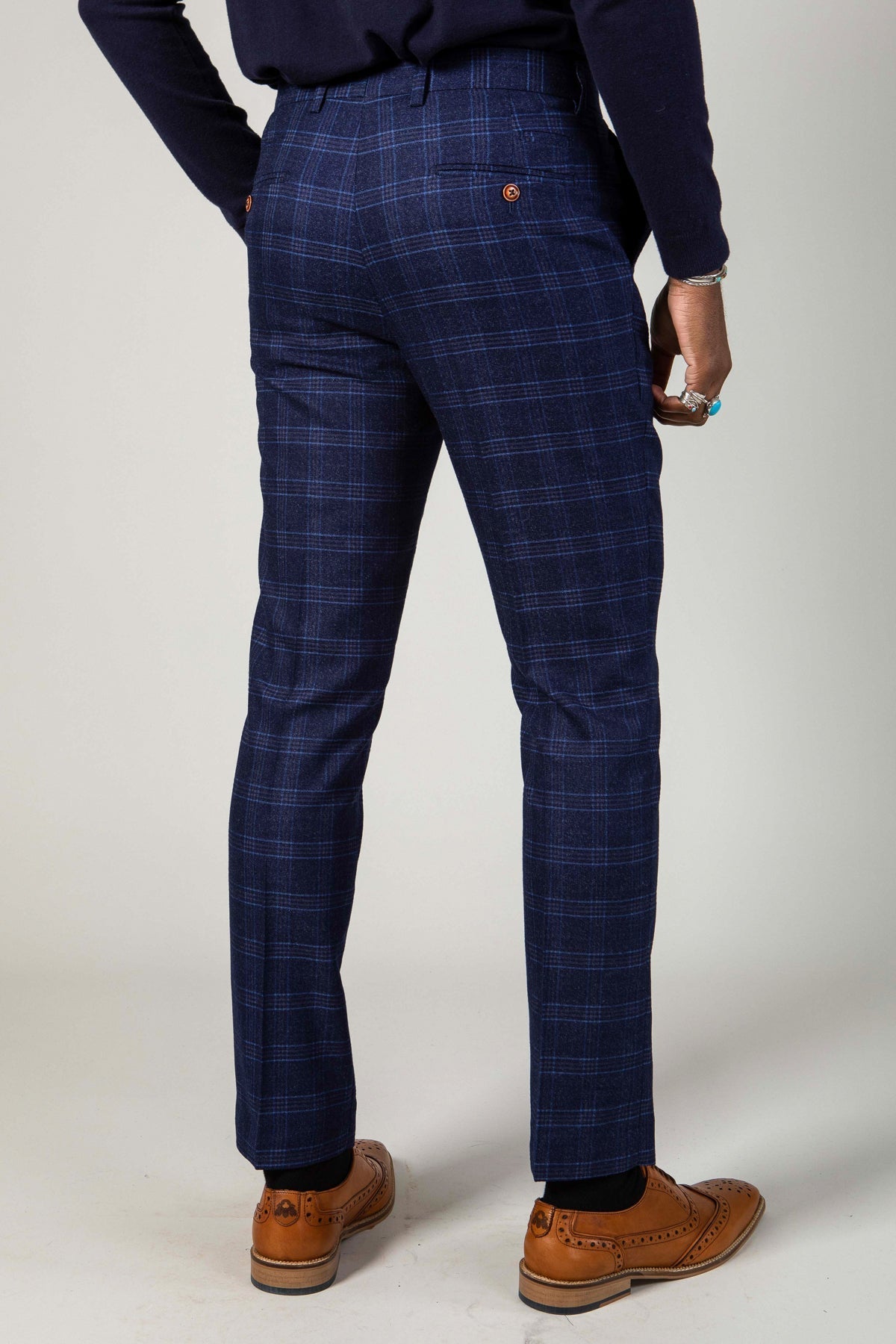 Man wearing men's CHIGWELL - Blue Tweed Check Trousers - Marc Darcy Menswear