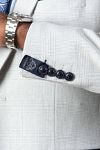 Man wearing men's BROMLEY - Stone Check Blazer - Marc Darcy Menswear