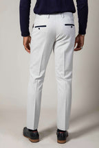 Man wearing men's BROMLEY - Stone Check Trousers - Marc Darcy Menswear