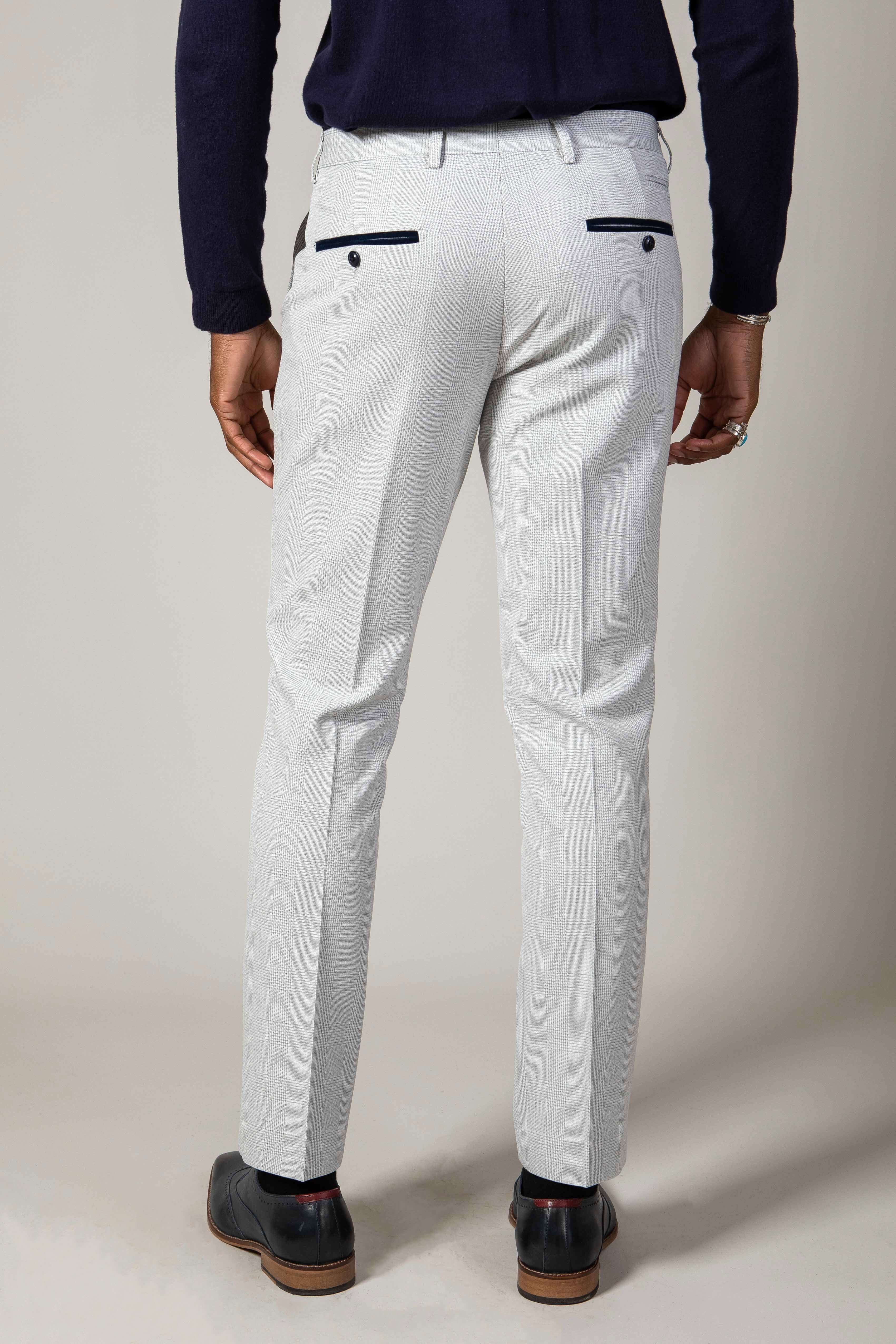 Man wearing men's BROMLEY - Stone Check Trousers - Marc Darcy Menswear