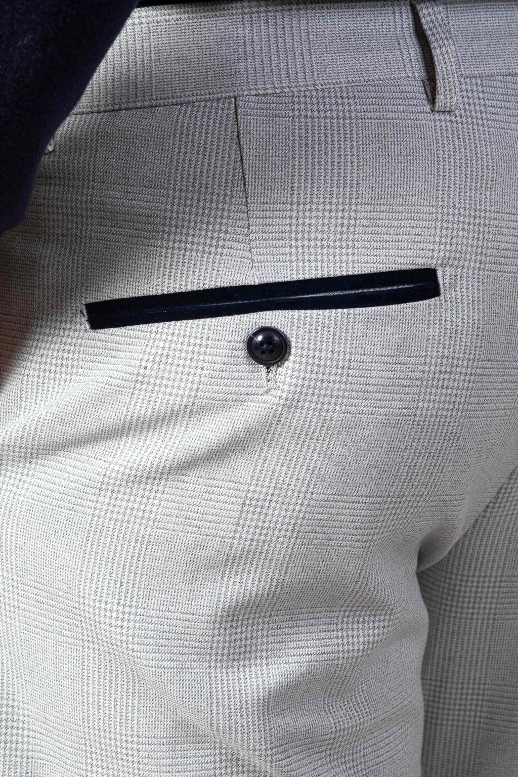 Man wearing men's BROMLEY - Stone Check Trousers - Marc Darcy Menswear