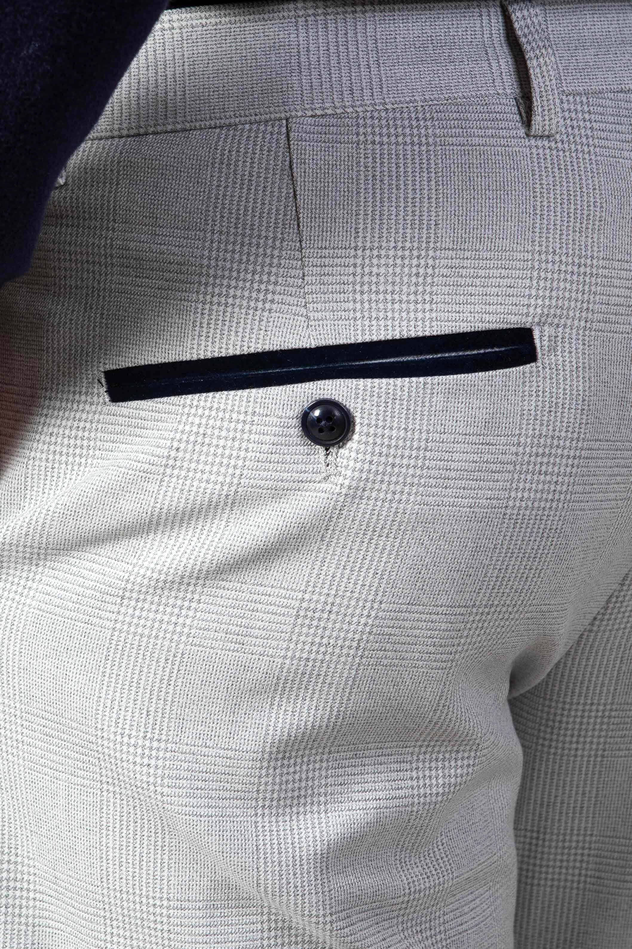 Man wearing men's BROMLEY - Stone Check Trousers - Marc Darcy Menswear