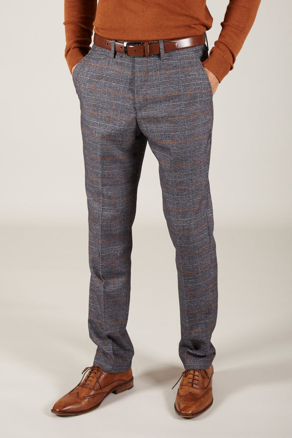 Man wearing men's JENSON - Grey Check Trousers - Marc Darcy Menswear