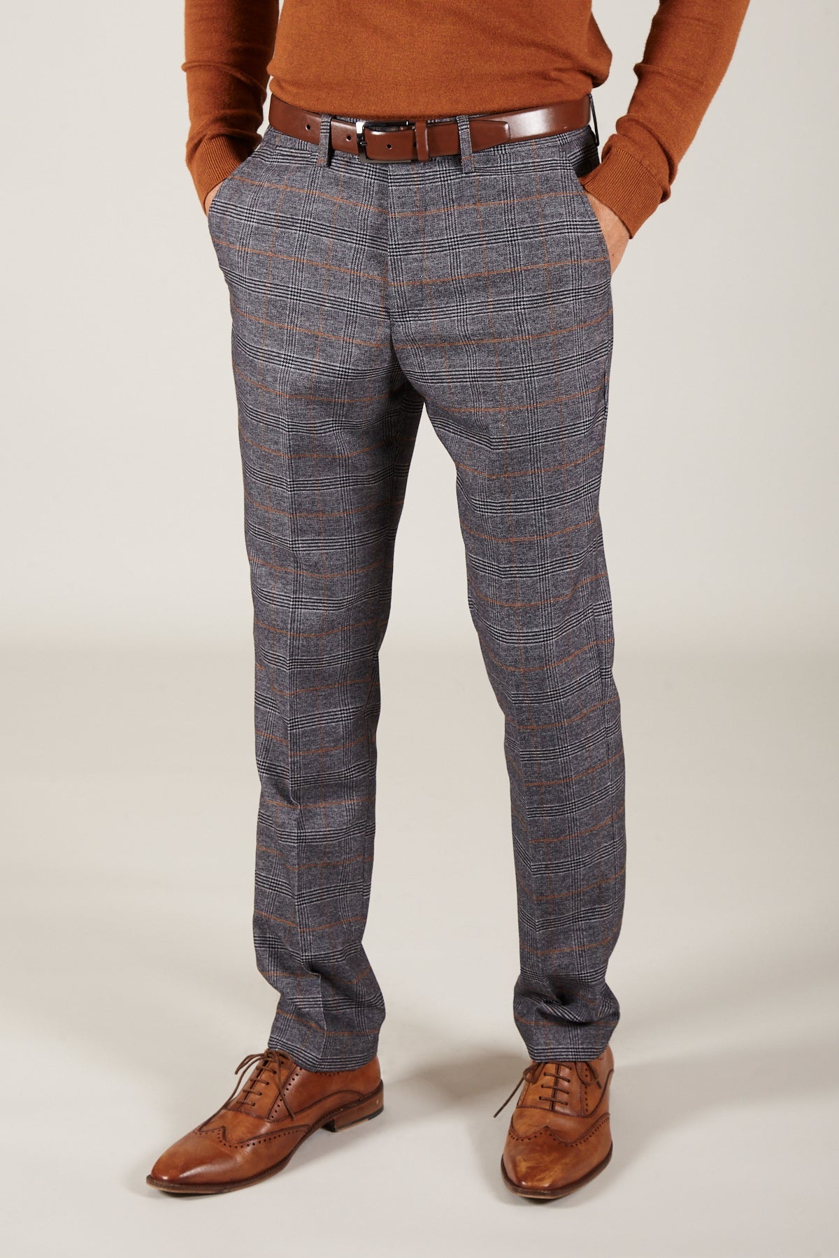 Man wearing men's JENSON - Grey Check Trousers - Marc Darcy Menswear