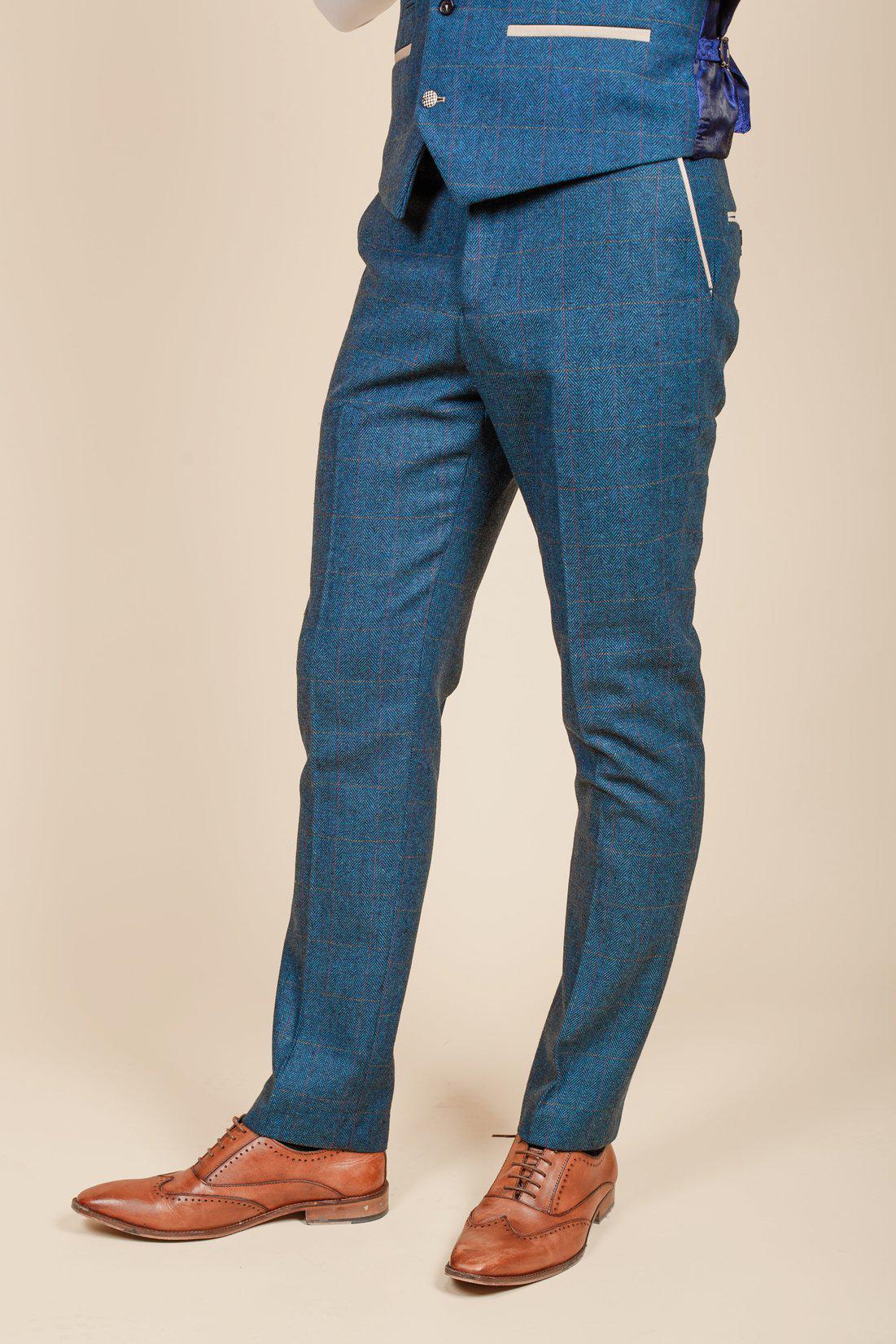Man wearing men's DION - Blue Tweed Check Trousers - Marc Darcy Menswear