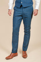 Man wearing men's DION - Blue Tweed Check Trousers - Marc Darcy Menswear