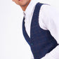 Man wearing men's HARRY - Indigo Single Breasted Tweed Check Waistcoat - Marc Darcy Menswear